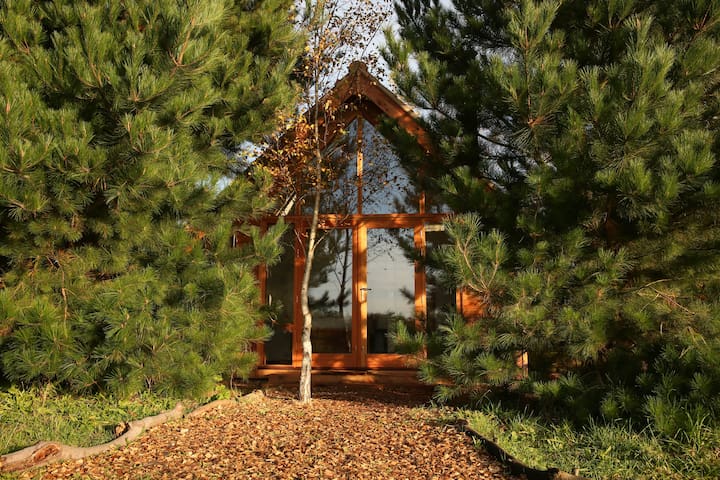 Luxury hideaway with valley view of stone circle